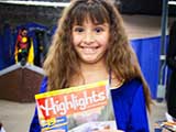 We gave <em>Highlights</em> and <em>Highlights High Five</em> magazines to the kids. © Denise Gary