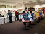 As visitors moved away from the opening wall, they entered a library packed with fascinating student projects. © Denise Gary