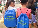 KNTR backpacks are sponsored by Bookmans Entertainment Exchange. © Denise Gary