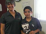 During the Dr Seuss event, a young man asked Denise if KNTR had a book about Harry Houdini. Denise surprised him in June with a fantastic book about The Great Houdini! © Denise Gary