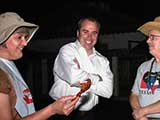 KNTR Chairman Tyson Breinholt joins the party, but isn't sure he wants to have anything to do with the crawfish. © Robert Gary