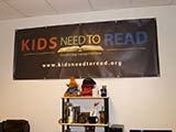 KNTR Banner in the Office