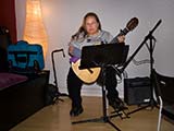 Classical guitarist Bonnie Lou Coleman entertained our guests.