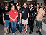 Denise, Batman, Catwoman, and Todd surround Phoenix Comicon staff, including Volunteer/Guest Director Brandy Kuschel (red shirt) and Programming Director Joe Boudrie. © Denise Gary
