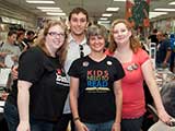 KNTR was given a table at the front of the store. (Debbie Brown, Jeffrey Huff, Denise Gary, and Marianne Luskey) © Bruce Matsunaga