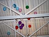 Gynasium ceiling festooned with runaway balloons © Denise Gary